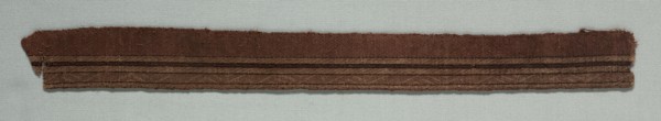 Two Galloon Fragments Mounted Together, late 1000s. Italy, Sicily, end of 11th century. Tablet