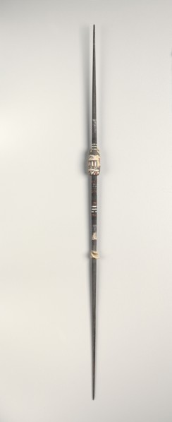 Spindle, c. 1st-3rd century. Peru, South Coast, Nasca style, early period. Wood with carved clay