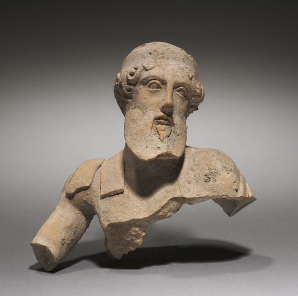 Fragment of a Reclining Male Figure, Perhaps a God, 300s BC. South Italy, Greece, 4th Century BC.