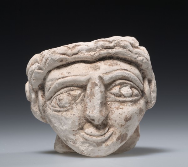 Female Head, 400s. Egypt, Coptic period, 5th Century. Limestone; overall: 9 x 10.2 cm (3 9/16 x 4