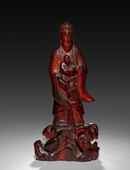 Guanyin, 18th Century. China, Qing dynasty (1644-1911). Amber; overall: 16.9 cm (6 5/8 in.).