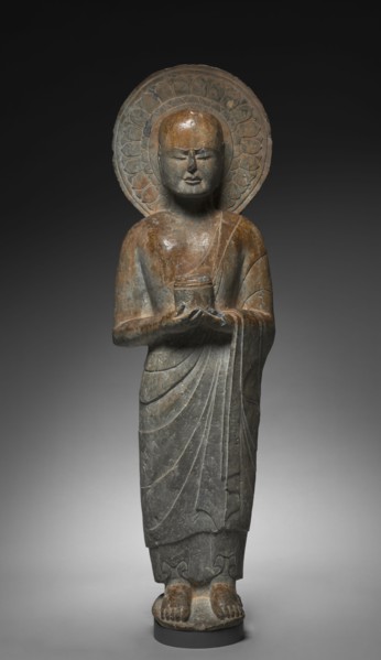 Standing Disciple Mahakasyapa Holding a Cylindrical Reliquary, c. 550. China, Hebei province,