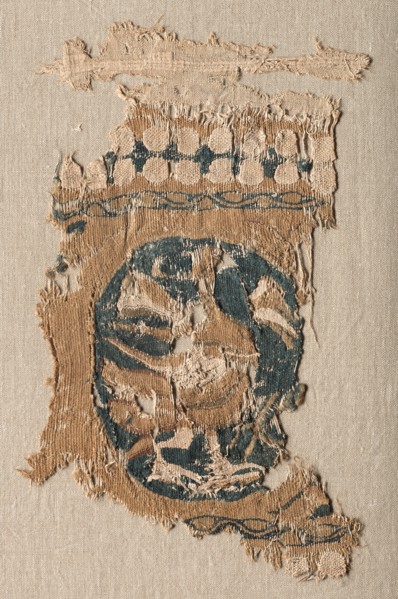 Fragment from a Hanging (?) with Roundel and Border, 800s - 900s. Egypt, late Abbasid - early