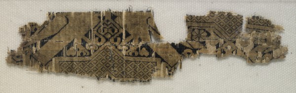 Textile Fragment with Portions of Eight-Pointed Star and Birds, 11th-12th century. Syria, Ayyubid
