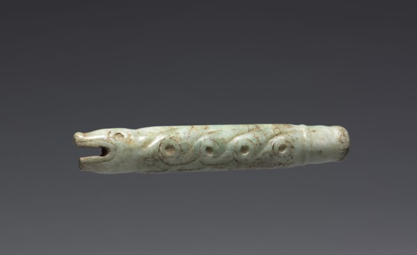 Serpent-form Fan Handle(?), 900-1519. Central Mexico, Mixtec. Pale green jade; diameter: 1.9 cm