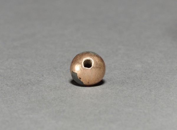 Bead, 1200-1519. Mexico, Oaxaca, Mixtec. Clay covered with gold; diameter: 1 cm (3/8 in.).