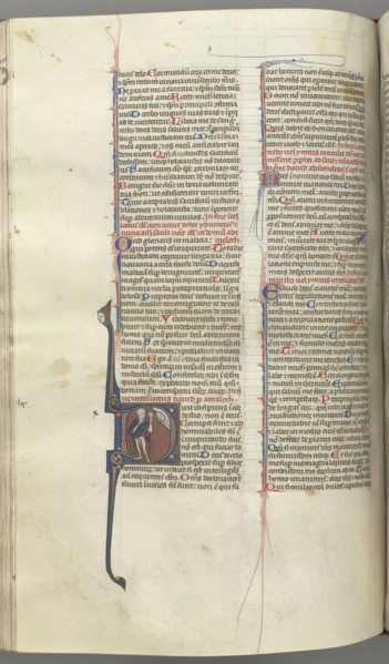 Fol. 222v, Psalm 52, historiated initial D, a fool naked but for a cloak, holding a bladder, bust