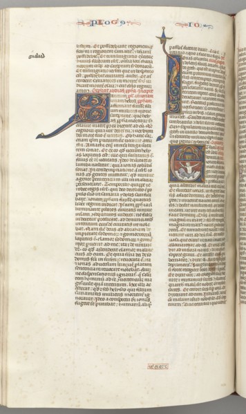 Fol. 357v, Jonah, historiated initial E, Jonah swallowed by the whale, a walled city above, c.