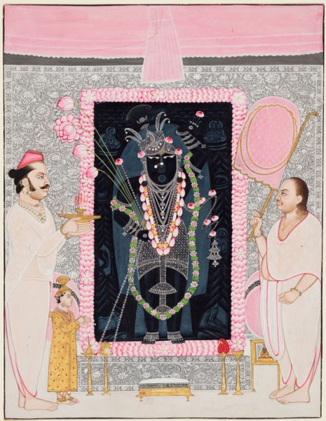 The head priest (Tilakayat) Govardhanlalji makes offerings to Shri Nathji in celebration of the