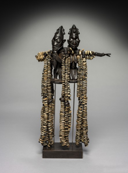 Eshu Dance Staff, 1800s. Guinea Coast, Nigeria, Yoruba people. Wood, leather, cowrie shells; 62 cm