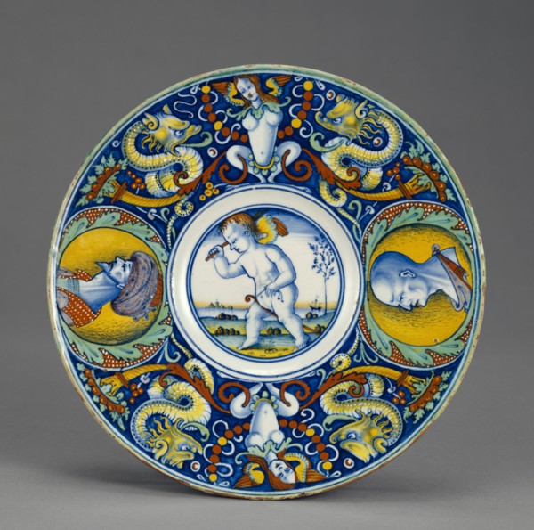 Dish with Cupid on a Hobbyhorse, Tondino, Possible Urbino area, Venice, or Pesaro, Italy; about 1510 - 1520; Tin-glazed