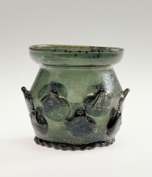 Prunted Beaker, Krautstrunk, Germany; 1480 - 1520; Free-blown dark green glass with applied decoration; 6.2 x 6.4 cm