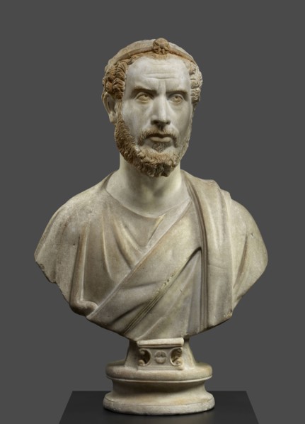 Portrait Bust of a Man, Perhaps a Priest of Serapis; Roman Empire; 180 - 220; Marble with polychromy and gilding; 79.5 × 49 × 27