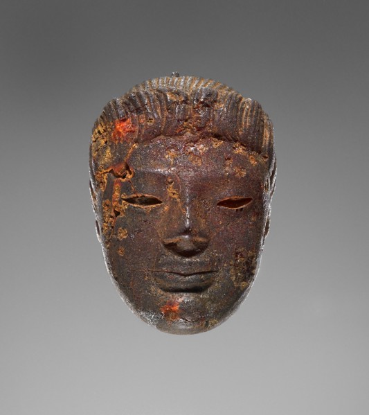 Pendant: Head of a Female Divinity or Sphinx; Tarentum, ?, Italy; 550 - 520 B.C; Amber; 34.5 × 24 × 16 mm