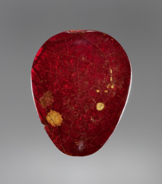 Pendant: Head of a Female Divinity or Sphinx; Italy; 550 - 525 B.C; Amber; 32 × 26 × 5 mm, 1 1,4 × 1 × 3,16 in