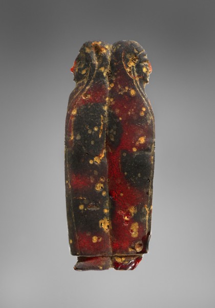 Pendant: Addorsed Females; Italy; 600 - 550 B.C; Amber; 40 × 102 × 13 mm, 39.3 g, 1 9,16 × 4 × 1,2 in., 0.0866 lb