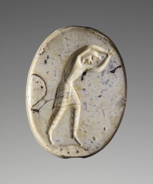 Scaraboid; Pendants Group; about 400 B.C; Mottled grey-white chalcedony; 0.9 × 2.5 × 1.9 cm, 3,8 × 1 × 3,4 in