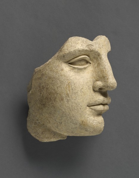 Fragment of a Head; Tarentum, Taras, South Italy; 440 - 430 B.C; Terracotta with clay slip; 14.2 × 14 cm, 5 9,16 × 5 1,2 in