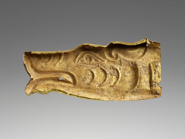 Applique in the shape of a wolf's head; Central Asia; 100 B.C.–A.D. 50; Gold and inlaid stones; 4.9 × 11.4 × 2.5 cm