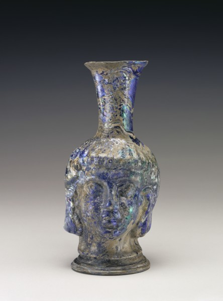 Flask in the Shape of a Head; Roman Empire; 4th - 5th century; Glass; 17.2 × 8 cm, 6 3,4 × 3 1,8 in