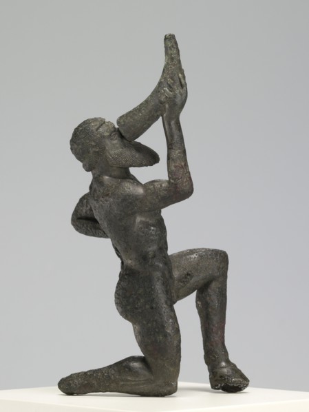 Statuette of a Kneeling Satyr; Greece; 480 - 460 B.C; Bronze; 9.8 × 4.1 × 5.4 cm, 3 7,8 × 1 5,8 × 2 1,8 in