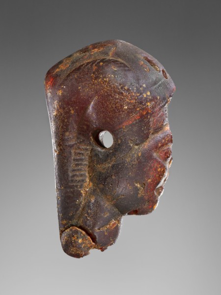 Pendant: Winged Female Head in Profile; Italy; 525 - 480 B.C; Amber; 79 × 49 × 25 mm, 3 1,8 × 1 15,16 × 1 in