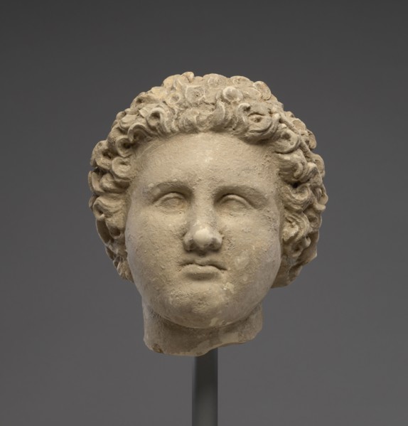 Head of a Man; Tarentum, Taras, South Italy; 325 - 275 B.C; Terracotta with white slip and polychromy, red, 17.1 × 14.3 cm