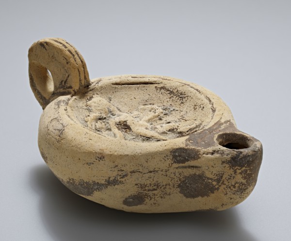 Lamp; Italy; late 1st - early 2nd century; Terracotta; 4 × 5.2 × 8 cm, 1 9,16 × 2 1,16 × 3 1,8 in