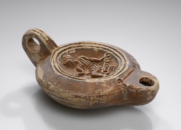 Lamp, North Africa; 1st - 4th century; Terracotta; 2.8 × 7.5 × 10.5 cm, 1 1,8 × 2 15,16 × 4 1,8 in