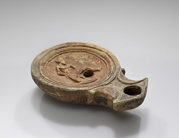 Lamp, Roman Empire; 1st century B.C. - 4th century A.D; Terracotta; 2.1 x 6.3 x 9.1 cm, 13,16 x 2 1,2 x 3 9,16 in