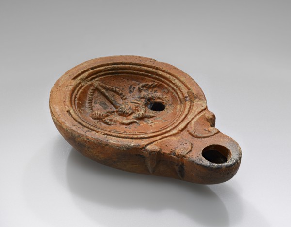 Lamp, Roman Empire; 1st century B.C. - 4th century A.D; Terracotta; 2.4 x 7.1 x 10 cm, 15,16 x 2 13,16 x 3 15,16 in