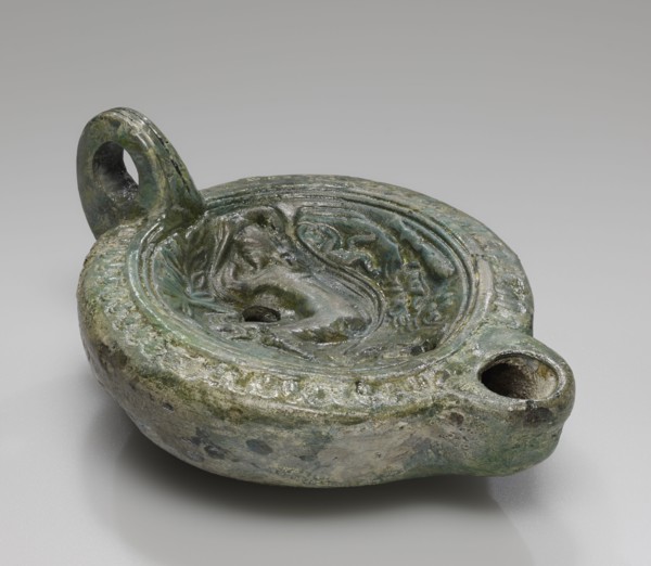 Lamp, Roman Empire; 1st century B.C. - 4th century A.D; Terracotta with green glaze; 3.2 x 9 x 12 cm, 1 1,4 x 3 9,16 x 4 3,4 in