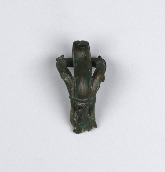 Lamp in the Shape of a Comic Mask; Roman Empire; 75 - 125; Bronze; 6.9 × 12.5 cm, 2 11,16 × 4 15,16 in