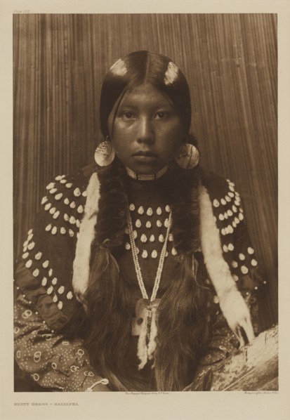 Dusty Dress - Kalispel; Edward S. Curtis, American, 1868 - 1952, 1910; Gravure; 40.1 x 28.1 cm 15 13,16 x 11 1,16 in