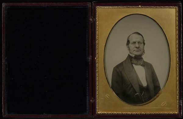 Portrait of an  middle-aged man with muttonchop whiskers, wearing wire-rimmed glasses; Mathew B. Brady American, about 1823