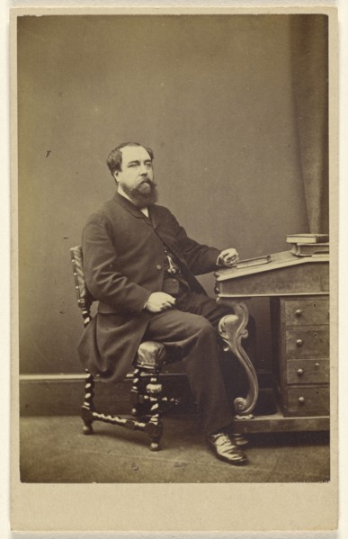 bearded man seated at writing desk, in 3,4 profile; London Stereoscopic and Photographic Company; about 1865; Albumen silver