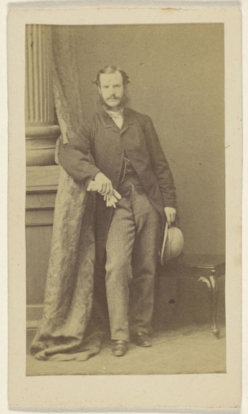 man with moustache & muttonchops, holding gloves in one hand, a hat in the other; F. Schwarzschild, British, active Calcutta