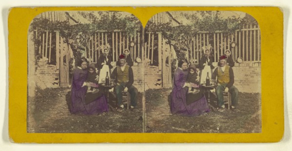 Genre scene: family seated outside aorund a table with glasses and a bottle of wine; London Stereoscopic Company, active 1854