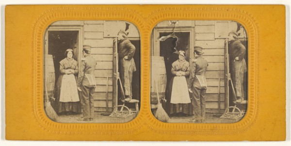 Woman talking to a man, another man standing on a chair peering at them over a door; 1855 - 1860; Hand-colored Albumen silver