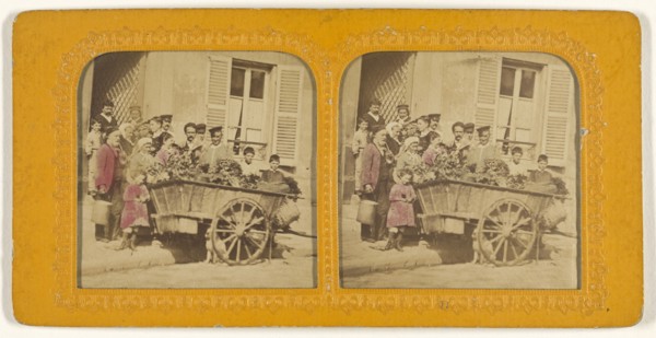 Group of people surrounding a cart of flowers; French; 1855 - 1860; Hand-colored Albumen silver print