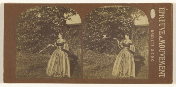 Woman bouncing shuttlecock on badminton racket; French; 1860s; Albumen silver print