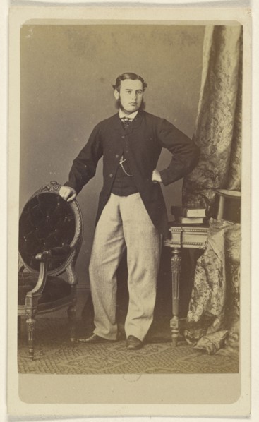 Man with muttonchops, standing; Schwarzschild & Co; 1860s; Albumen silver print