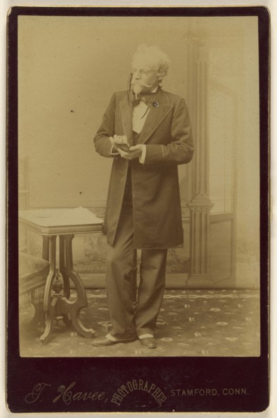 A Game of Cards, actor holding playing cards, standing; Theophile W.M. Havee, American, 1848 - 1921, active Stamford