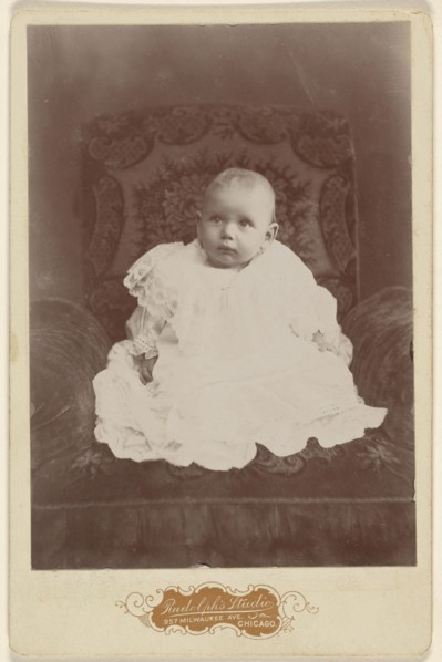 Baby girl in white dress, seated; Louis Rudolph, American, active 1890s, about 1890; Gelatin silver print