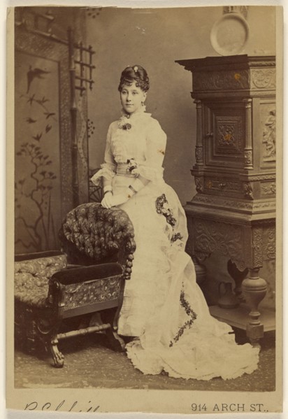 Woman in long white dress, standing; American; 1880s; Albumen silver print