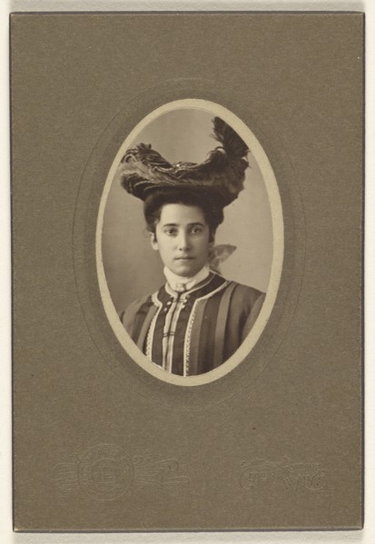 woman wearing a feathered hat, printed in oval cut; Bloomingdale Brothers; October 1904; Gelatin silver print