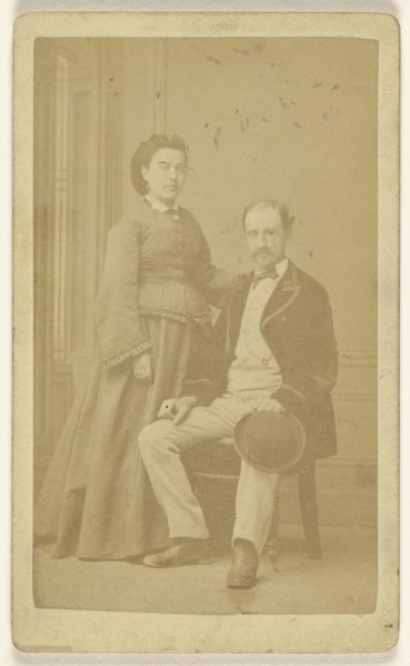couple: woman, standing; man seated; Paul Bourgeois, French, active 1900s, about 1865; Albumen silver print