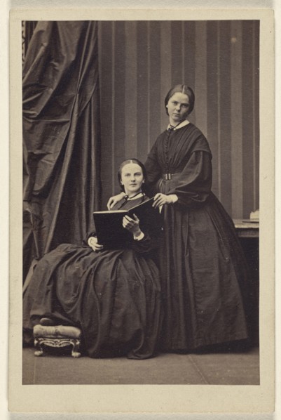 E.J.B. two  women: one seated, holding a book; one standing; Camille Silvy, French, 1834 - 1910, about 1866; Albumen silver