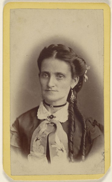 woman with two long curls, printed in vignette-style; E.J. Potter, American, active 1870s - 1890s, 1870 - 1875; Albumen silver