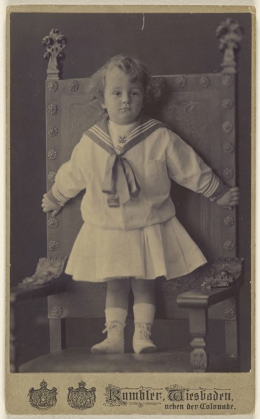 little girl standing in an ornate chair; Rumbler, German, active Wiesbäden, Germany 1860s - 1870s, 1875 - 1880; Carbon or